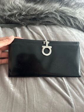 Salvatore Ferragamo Black Patent Leather wallet with Silver Gancini.